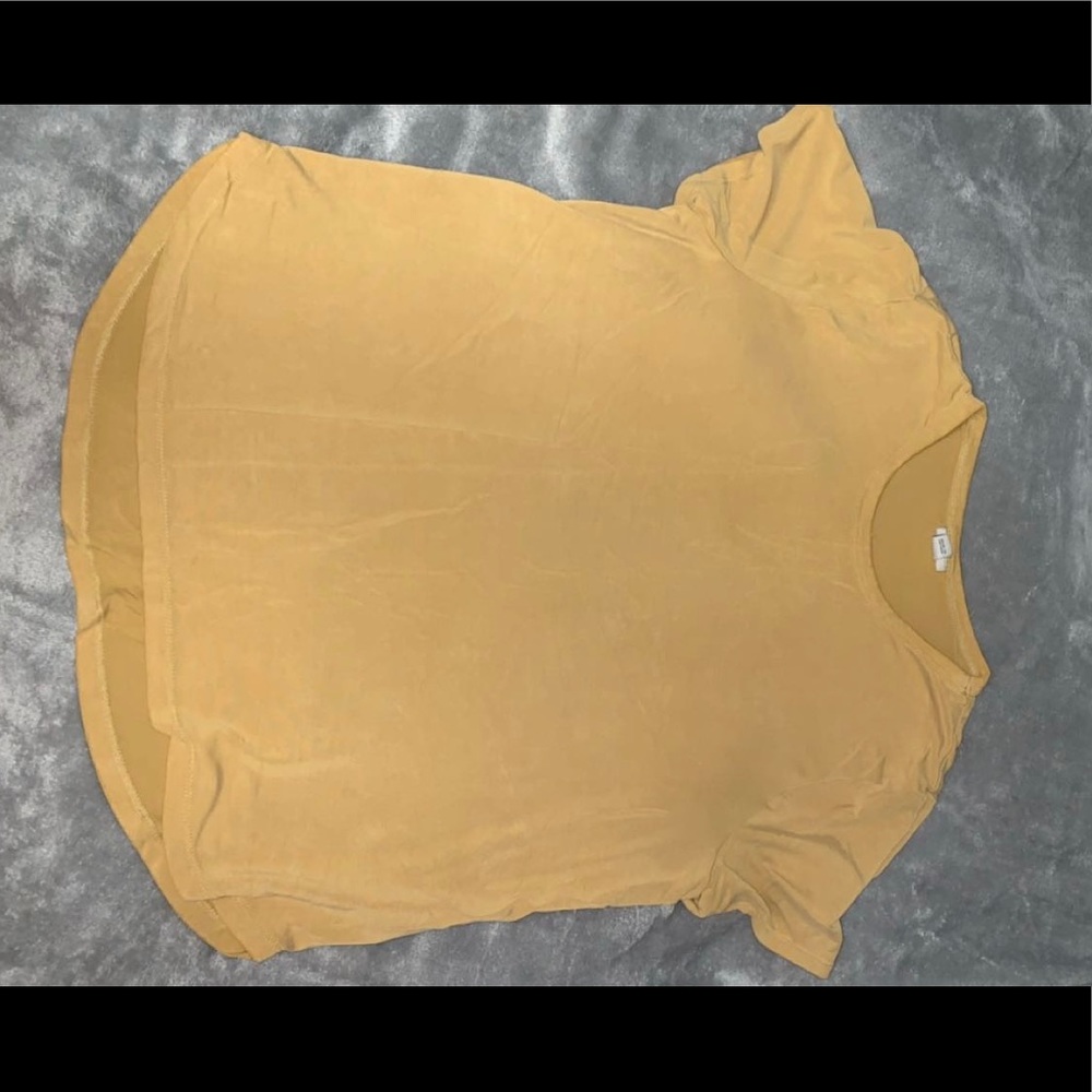 mustard yellow shirt